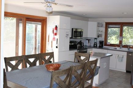 Eastham Cape Cod vacation rental - Main kitchen w/ dining up to 8 added safety, A fire extinguisher