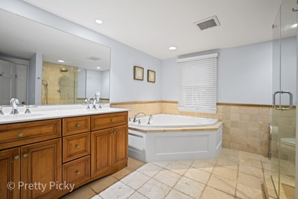 North Chatham Cape Cod vacation rental - Master bath, double sink vanity, tile shower and soaking tub