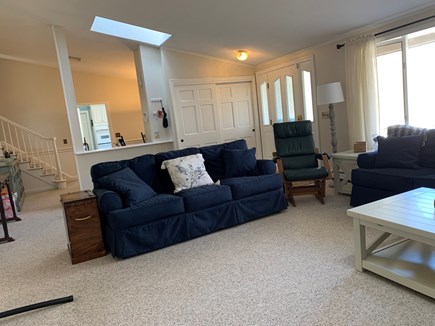 West Yarmouth Cape Cod vacation rental - Living room with view into dining room & kitchen.