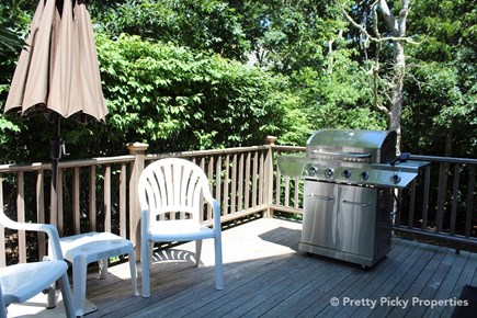 West Yarmouth Cape Cod vacation rental - Side deck off the kitchen offers a new grill
