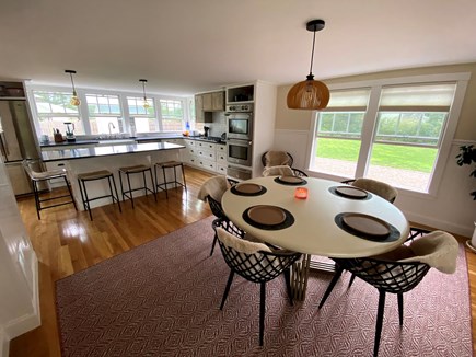East Falmouth Cape Cod vacation rental - A sun drenched kitchen and dining room with plenty of seating.