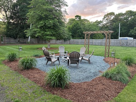 East Falmouth Cape Cod vacation rental - Backyard Firepit with adirondacks