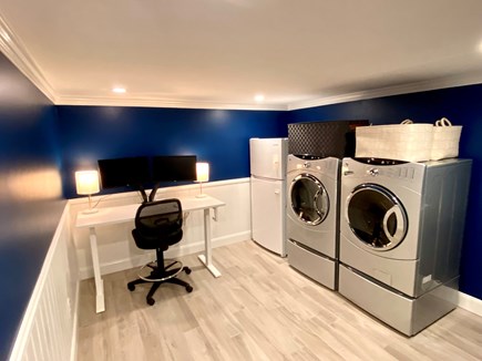 East Falmouth Cape Cod vacation rental - Washer/Dryer in the basement with desk for remote workers.