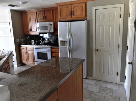 Plymouth, Cedarville Village MA vacation rental - Kitchen: granite, pantry, peninsula, door to laundry & garage