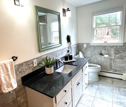 Harwich Cape Cod vacation rental - Main bathroom has a shower, as well as the Washer & Dryer