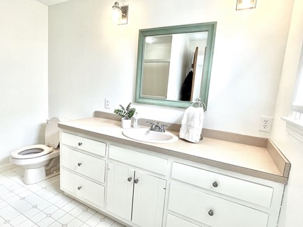 Harwich Cape Cod vacation rental - The upstairs ensuite bathroom is sunny and has a bathtub