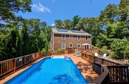 Harwich Cape Cod vacation rental - Private heated outdoor pool and exclusive green space in backyard