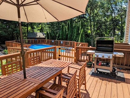 Harwich Cape Cod vacation rental - Grill away while enjoying the pool and backyard tranquility