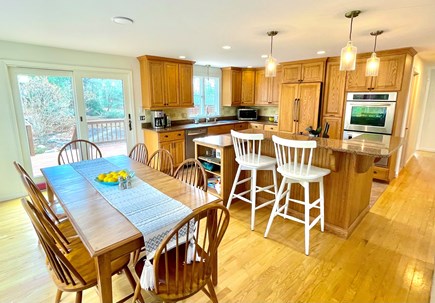 Harwich Cape Cod vacation rental - The dining area accesses the back deck and accomodates 10 people