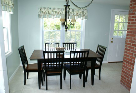 East Sandwich Cape Cod vacation rental - Dining Room with side entrance and & stairs to lower level patio