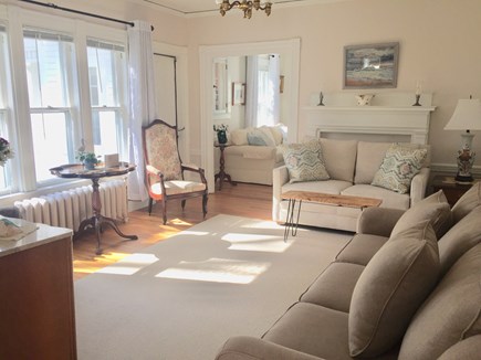South Eastham Cape Cod vacation rental - Sitting room with small dining area, bright views to back yard