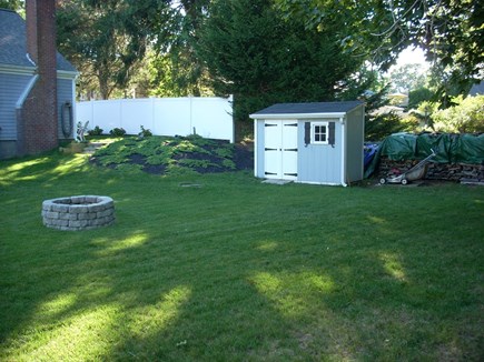Harwich Cape Cod vacation rental - Back yard and fire pit
