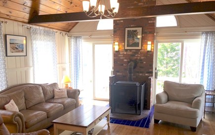 Orleans Cape Cod vacation rental - Inviting Family Room with wood stove opens to deck