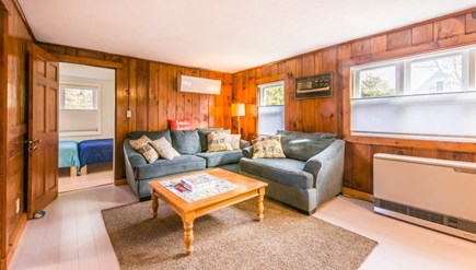 East Sandwich Cape Cod vacation rental - Living area with game table and AC wall unit