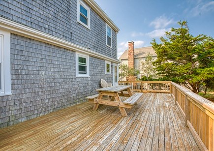 East Sandwich Cape Cod vacation rental - Expansive deck off Kitchen (will have table & chairs setup)