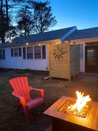 West Yarmouth Cape Cod vacation rental - Quiet, open backyard. Propane firepit with outdoor shower