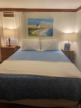 Eastham Cape Cod vacation rental - Queens size bed and local art.