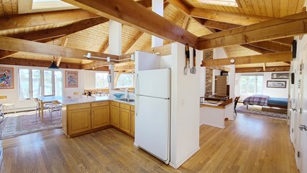 Wellfleet Cape Cod vacation rental - Kitchen and open loft bedroom with privacy screen