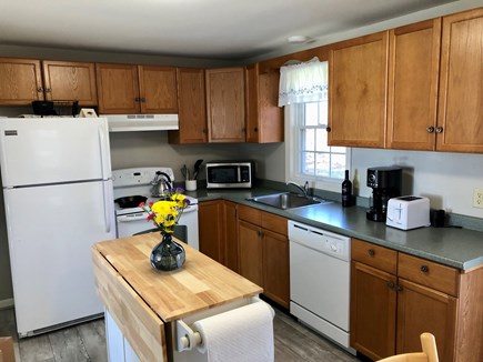 Harwich Cape Cod vacation rental - Kitchen w DW, Electric Stove, Microwave, Coffee Maker & Island!