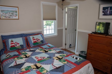 Hyannis Cape Cod vacation rental - Queen bedroom with half-bath, on main floor