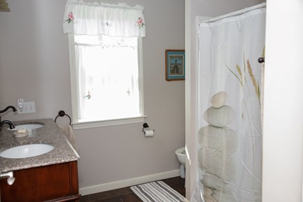 Hyannis Cape Cod vacation rental - Bathroom with double sink and roll-in shower