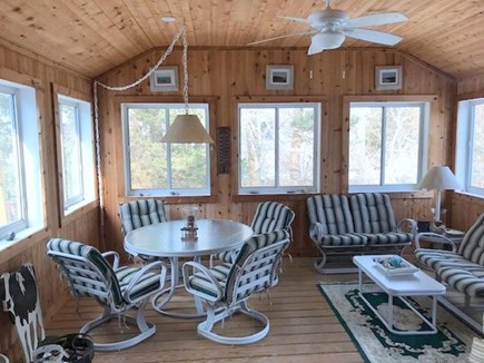 Eastham Cape Cod vacation rental - Screened Porch Room with Dining and Seating Areas