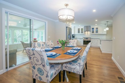 Osterville Cape Cod vacation rental - Open dining area with slider to sunroom