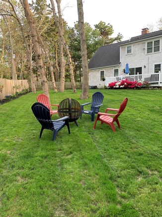Sandwich, Forestdale Cape Cod vacation rental - Firepit seating in fenced back yard
