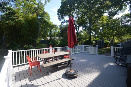 Falmouth Cape Cod vacation rental - Back deck over looking the garden with a gas and charcoal grill