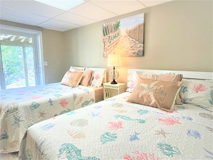 Wellfleet, Shell City - Lt. Island Cape Cod vacation rental - Downstairs bedroom with 2 full beds and walk out slider