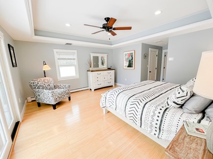 Centerville, Town of Barnstable Cape Cod vacation rental - Second floor bedroom with king size bed, seating area and balcony