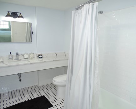 Orleans Cape Cod vacation rental - First floor main bath room with tub and shower
