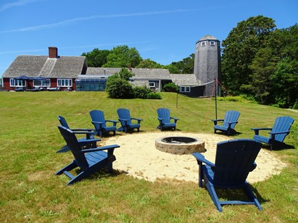 Orleans Cape Cod vacation rental - Large fire pit area at base of yard