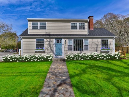 Harwich Cape Cod vacation rental - Front of the main house - visually enhanced with flowers