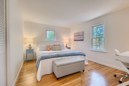 Eastham Cape Cod vacation rental - King bedroom with Smart TV, new mattress in 2022, and desk area