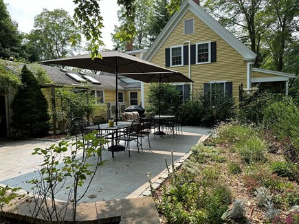 Eastham  Cape Cod vacation rental - Outdoor patio off kitchen and breezeway with Weber gas grill