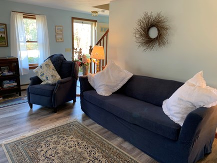 East Harwich Cape Cod vacation rental - Comfortable living room with recliner and TV.