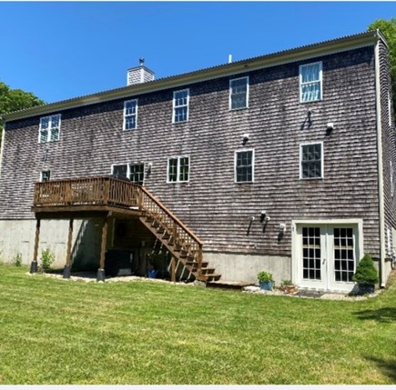 East Falmouth Cape Cod vacation rental - Backyard is large, flat, private, and leads to nature trail