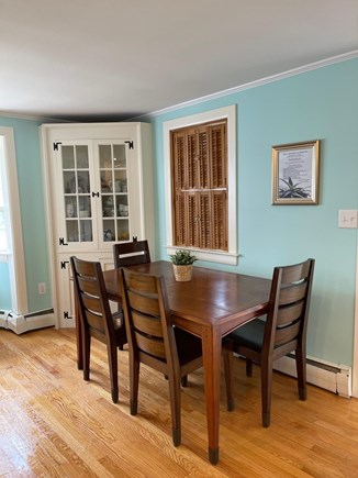South Yarmouth Cape Cod vacation rental - Kitchen dining area, table insert, bench and chairs available.
