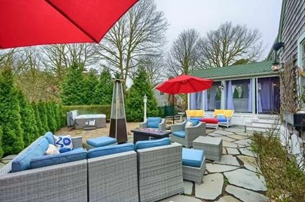 Harwich Cape Cod vacation rental - Another view of the back yard patio and screened in porch
