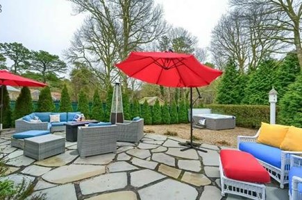 Harwich Cape Cod vacation rental - Back Patio with hot tub and plenty of seating