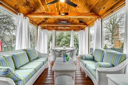Harwich Cape Cod vacation rental - Lovely screened in porch with two couches and table