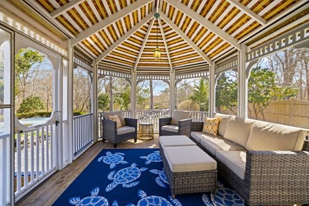 Barnstable Cape Cod vacation rental - Screened-in porch off the family room