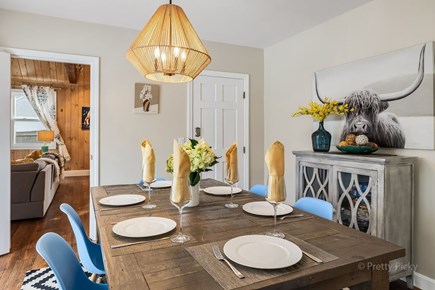 Barnstable Cape Cod vacation rental - Dining room area between the two living spaces