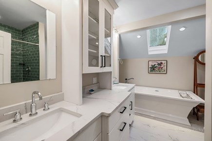 Barnstable Cape Cod vacation rental - Ensuite bathroom for primary bedroom with shower & two sinks