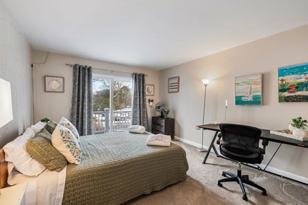 Barnstable Cape Cod vacation rental - Guest bedroom #1 has a door to pool area and queen bed