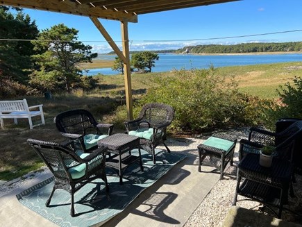 Wellfleet Cape Cod vacation rental - Additional ground level seating overlooking water view.