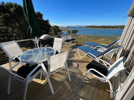 Wellfleet Cape Cod vacation rental - Upper deck seating and grill with water view.