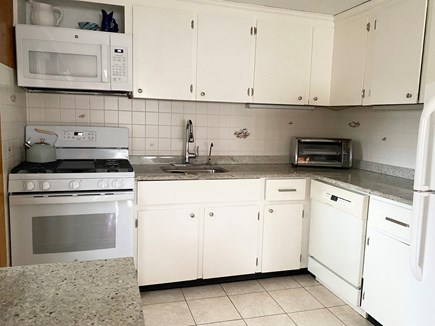 Falmouth Cape Cod vacation rental - Bright kitchen has new gas stove, dishwasher,Keurig & coffee pot.