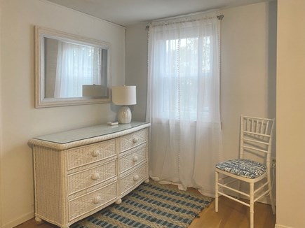 Falmouth Cape Cod vacation rental - Sunny corner in the master with wicker dresser.
